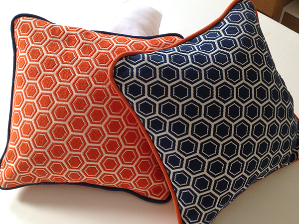 piped orange and blue cushions - handmade
